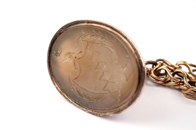 Lot 596 - A selection of 19th Century fob seals on gold bracelet