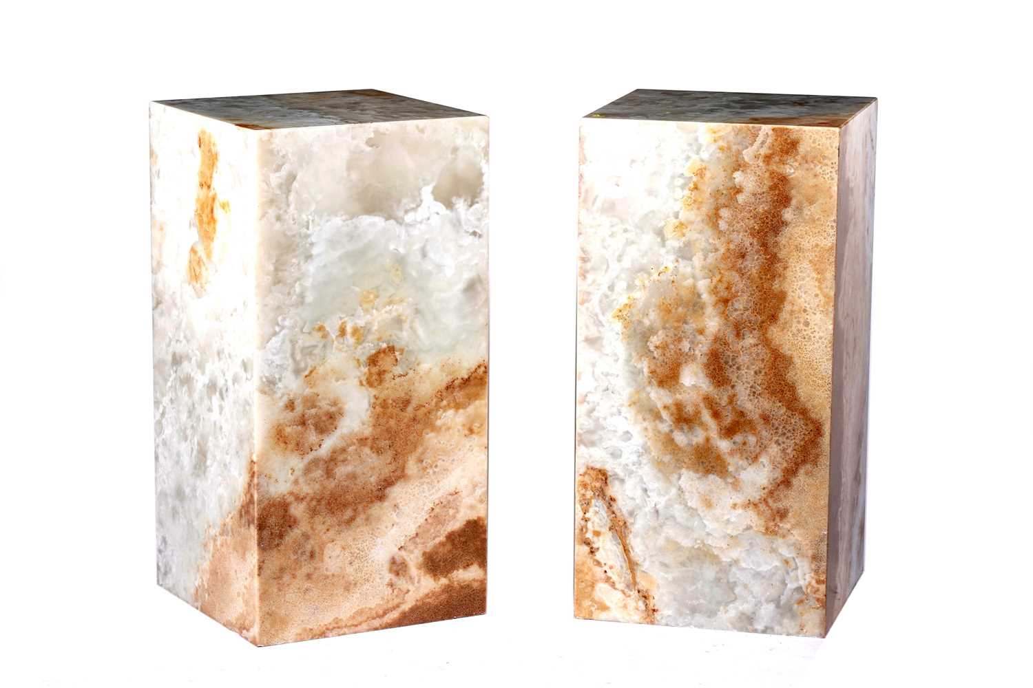 Lot 68 - A pair of contemporary onyx pedestals