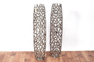 Lot 196 - A pair of Rama Twigs silvered aluminium contemporary floor standing vases