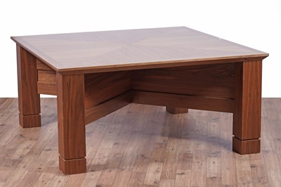 Lot 16 - A substantial contemporary teak and banded dining/centre table