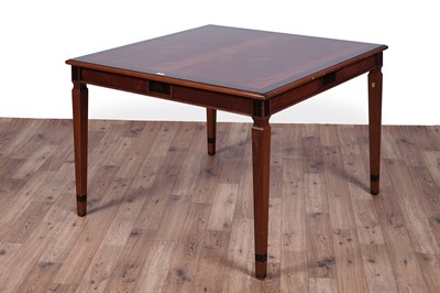 Lot 17 - A Georgian style mahogany and zebrawood banded dining/centre table