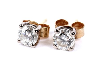 Lot 254 - A pair of diamond stud earrings