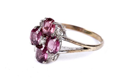 Lot 272 - An amethyst and diamond flower cluster ring