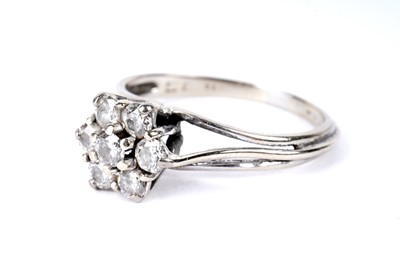 Lot 344 - A diamond flower cluster ring