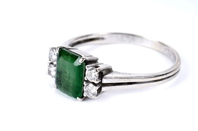 Lot 348 - Amendment - An emerald doublet and diamond ring