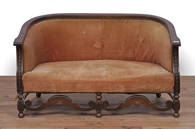 Lot 34 - A carved oak tub sofa, c.1920's