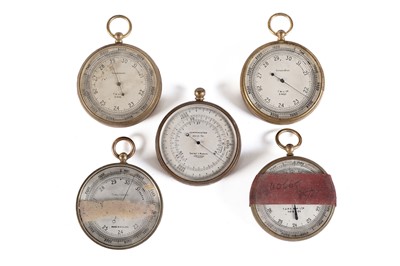 Lot 604 - A collection of five brass cased pocket compensated barometers