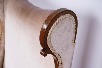 Lot 63 - An Edwardian inlaid mahogany wingback armchair