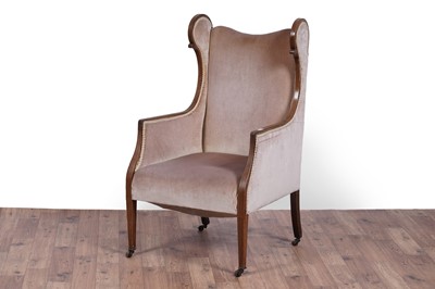 Lot 63 - An Edwardian inlaid mahogany wingback armchair