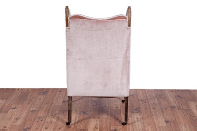 Lot 63 - An Edwardian inlaid mahogany wingback armchair