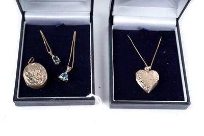 Lot 320 - Two topaz pendant necklaces; and two others