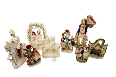 Lot 324 - A collection of 19th Century Staffordshire flatbacks and spill vases