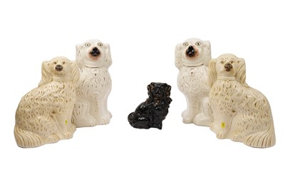 Lot 331 - Five Staffordshire hearth dogs