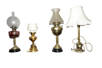 Lot 204 - Four Victorian and later oil and converted lamps