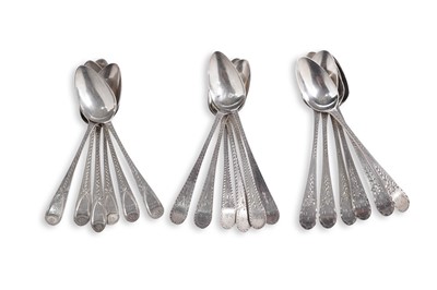 Lot 220 - A set of six George III silver bright-cut teaspoons; and two other sets