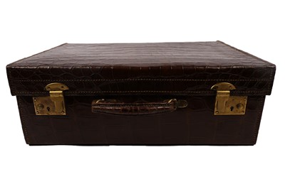 Lot 254 - An early 20th Century crocodile leather suitcase