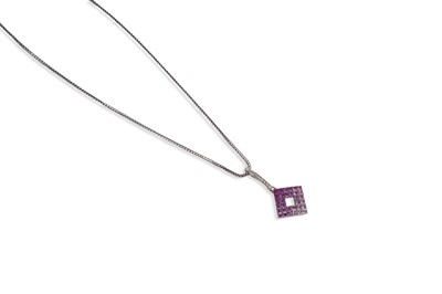 Lot 685 - A modern design pink sapphire and diamond pendant