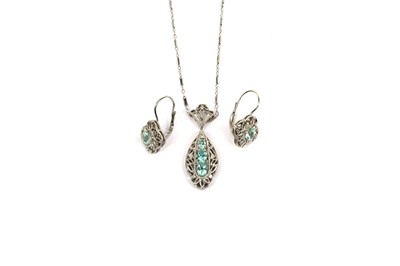 Lot 693 - A zircon and diamond pendant and earrings