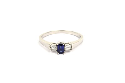 Lot 699 - A sapphire and diamond ring