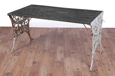 Lot 80 - A Vintage three-piece white painted cast metal garden suite