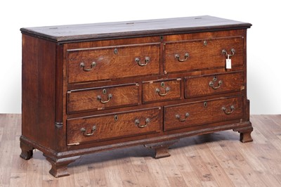 Lot 79 - A George III oak and mahogany banded Lancashire mule chest