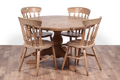 Lot 83 - A vintage pine table; and four beech chairs