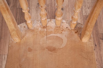 Lot 83 - A vintage pine table; and four beech chairs