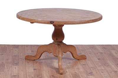 Lot 83 - A vintage pine table; and four beech chairs