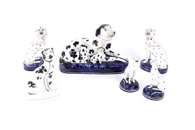 Lot 932 - A group of six Staffordshire dalmatians