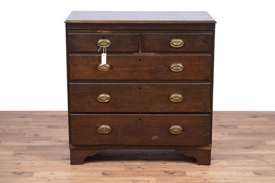 Lot 144 - A George III oak chest of drawers
