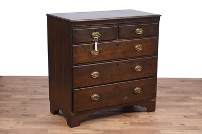 Lot 144 - A George III oak chest of drawers