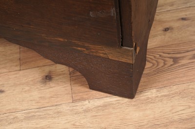 Lot 144 - A George III oak chest of drawers