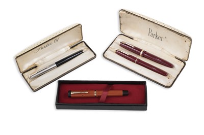 Lot 353 - A Parker ‘Duofold Jr. lucky curve’ fountain pen; and three others