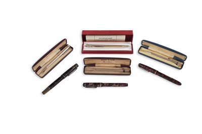 Lot 354 - A Burnham No.55 fountain pen; and six others