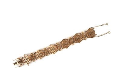 Lot 813 - A diamond and gold bracelet