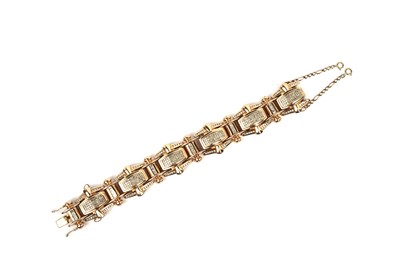 Lot 813 - A diamond and gold bracelet