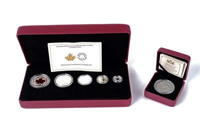 Lot 1285 - A Canadian Mint fine silver five-coin Fractional set; and another