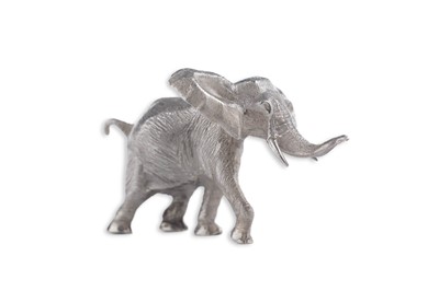 Lot 444 - An Elizabeth II cast silver miniature figure of an elephant