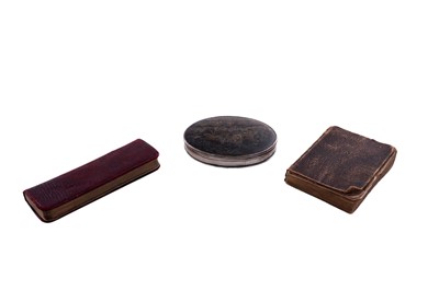 Lot 284 - An early 18th century silver mounted tortoiseshell snuff box; and two miniature books