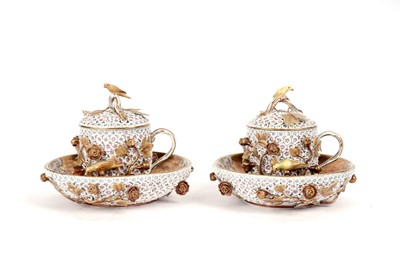 Lot 1008 - A pair of Meissen 'Schneeballen' covered cups and saucers