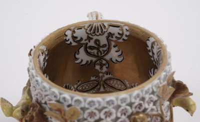 Lot 1008 - A pair of Meissen 'Schneeballen' covered cups and saucers