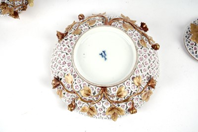 Lot 1008 - A pair of Meissen 'Schneeballen' covered cups and saucers