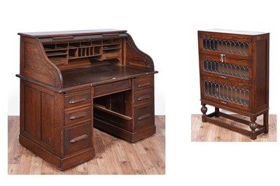 Lot 113 - An early 20th century oak rolltop desk; and a 20th Century oak bookcase