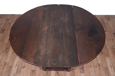 Lot 104 - An 18th Century oak drop-leaf dining table; and other items