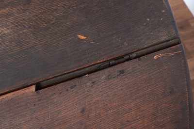 Lot 104 - An 18th Century oak drop-leaf dining table; and other items