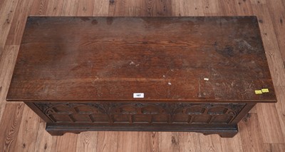 Lot 107 - A Georgian style carved oak coffer; and a late Georgian inlaid mahogany tea table