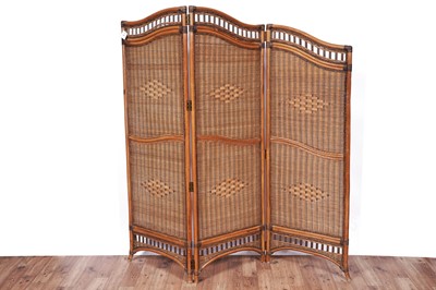 Lot 105 - A Mid Century bamboo and rattan threefold screen/room divide