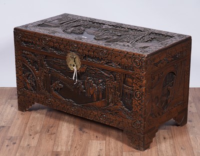 Lot 103 - A 20th Century Oriental carved camphor wood blanket box
