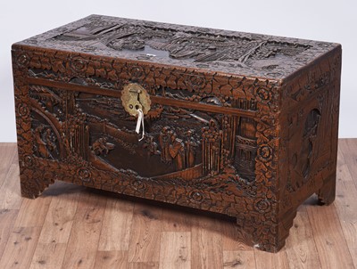 Lot 103 - A 20th Century Oriental carved camphor wood blanket box
