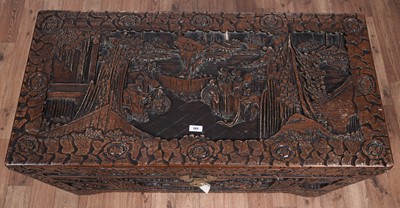 Lot 103 - A 20th Century Oriental carved camphor wood blanket box